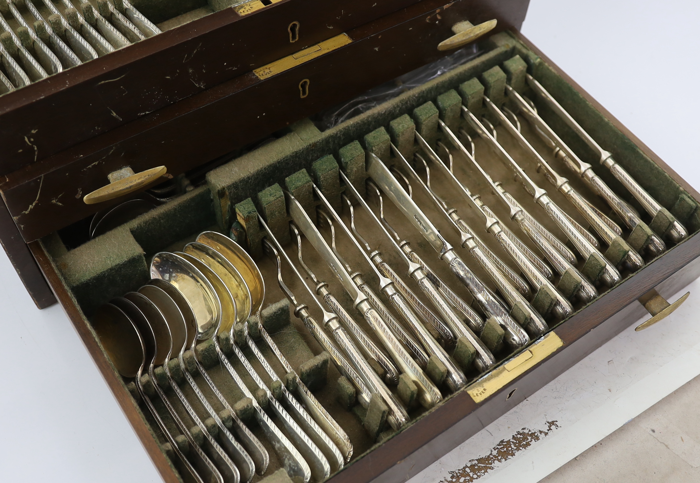 A modern complete canteen of Queen Elizabeth II silver Old English feather edge pattern cutlery for twelve, by James Dixon & Sons